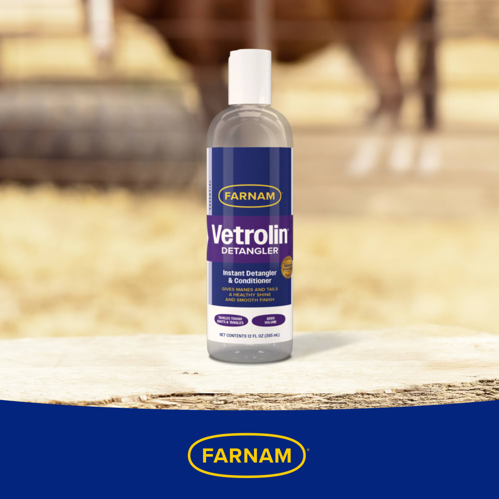 Bottle placed on ledge in outdoor stable setting